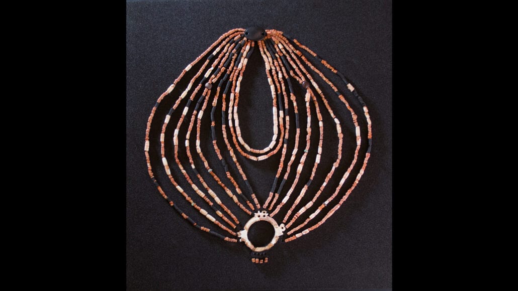 Unveiling Social Complexity Through an Ancient Child’s Ornate Necklace