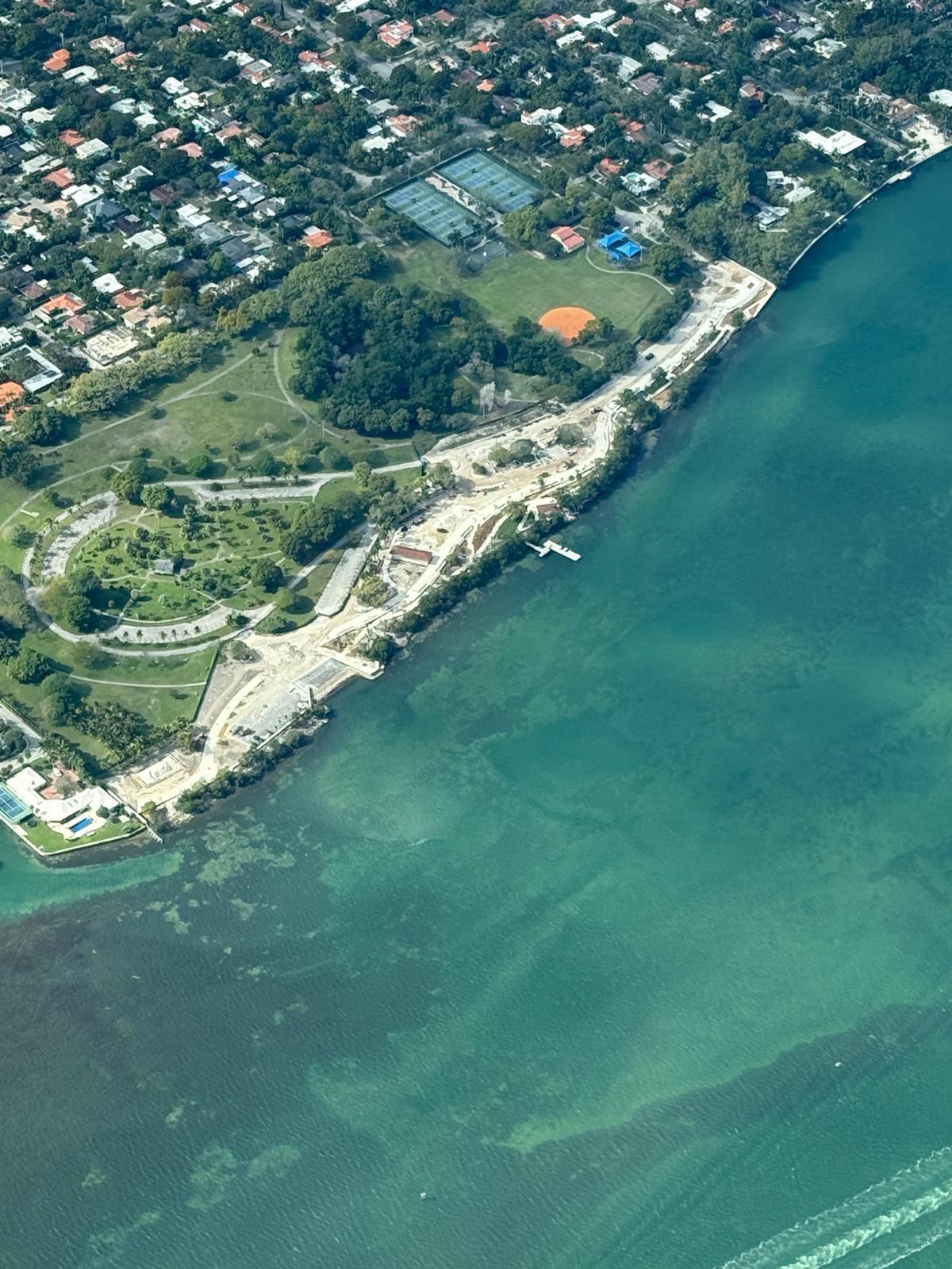 Aerial view of Morningside Park after concrete transformation showing extensive hardscape along waterfront