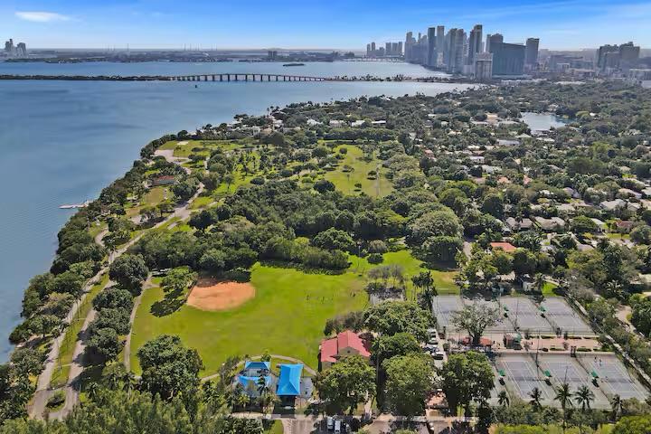 Aerial view of Morningside Park before concrete transformation showing lush green space and natural waterfront